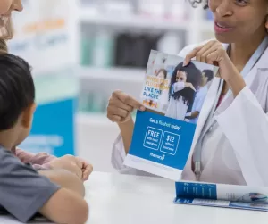 A healthcare provider explaining one of their materials written with inclusive language