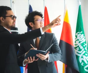 2 professionals from different cultural background is having a conversation on how to overcome language barriers